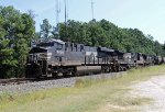 NS 8030 leads two other GE's and empty grain train 51X westbound